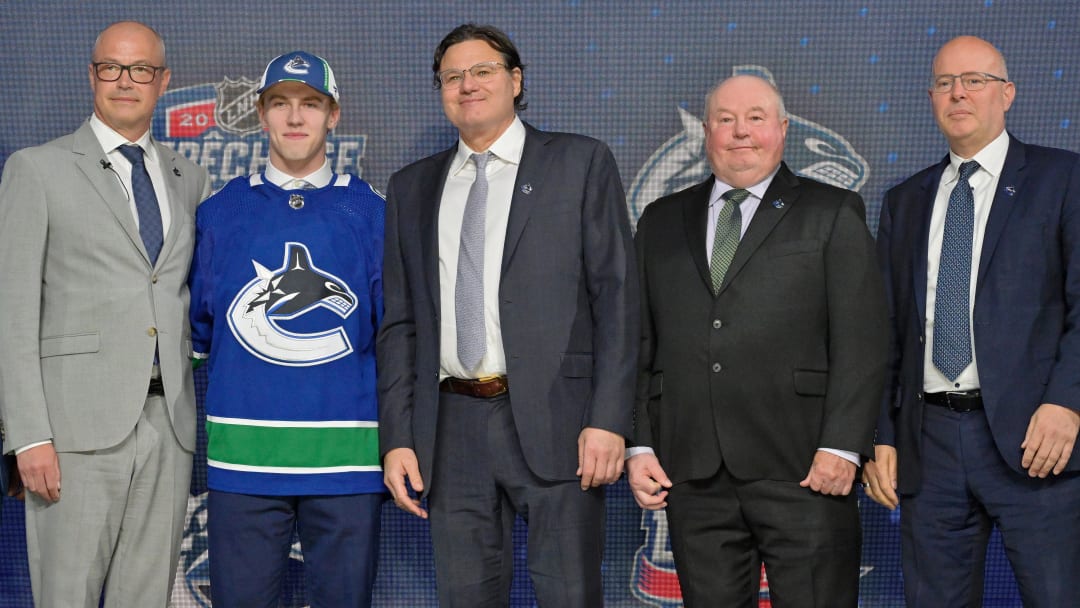 Jul 7, 2022; Montreal, Quebec, CANADA; Jonathan Lekkerimaki after being selected as the number fifteen overall pick to the Vancouver Canucks in the first round of the 2022 NHL Draft at Bell Centre. Mandatory Credit: Eric Bolte-USA TODAY Sports