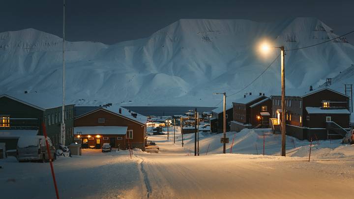 The remote town of Longyearbyen in Svalbard, Norway, relies on 24/7 streetlights during its months-long winter polar night.