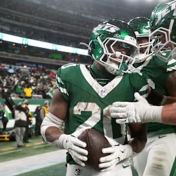 New York Jets running back Breece Hall (20) celebrates with his teammates after scoring a fourth quarter touchdown, Sunday January 5, 2025, in East Rutherford.