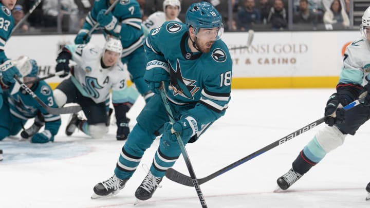 Apr 1, 2024; San Jose, California, USA;  San Jose Sharks right wing Filip Zadina (18) controls the puck during the third period against the Seattle Kraken at SAP Center at San Jose. Mandatory Credit: Stan Szeto-USA TODAY Sports