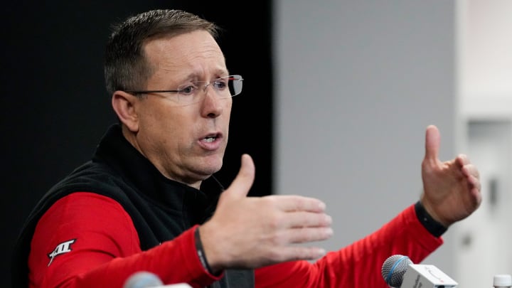 University of Cincinnati football head coach Scott Satterfield introduces his new defensive coordinator, Tyson Veidt, during a press conference at Fifth Third Arena in Cincinnati on Monday, Jan. 29, 2024. Veidt comes to UC from Iowa State.