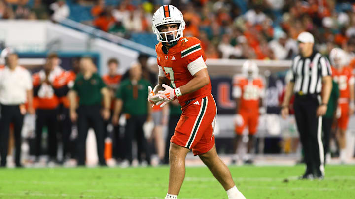 Sep 7, 2024; Miami Gardens, Florida, USA; Miami Hurricanes wide receiver Xavier Restrepo (7) at the line of scrimmage against the Florida A&M Rattlers during the third quarter at Hard Rock Stadium. Mandatory Credit: Sam Navarro-Imagn Images