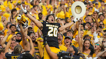 Missouri Tigers linebacker Nicholas Rodriguez (20) celebrates with teammates after a win versus the Kansas Jayhawks this season.