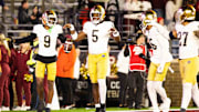 Nov 1, 2025; Chestnut Hill, Massachusetts, USA; Notre Dame safety Tae Johnson (9) and Notre Dame Fighting Irish defensive lineman Boubacar Traore (5) celebrate an interception in the fourth quarter against the Boston College Eagles at Alumni Stadium. Mandatory Credit: Edward Finan-Imagn Images