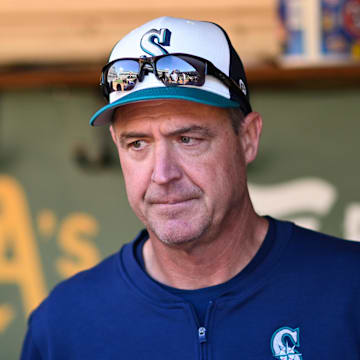 Seattle Mariners manager Dan Wilson talks with media in the dugout before a game against the Oakland Athletics on Sept. 4 at Oakland Coliseum.