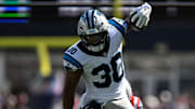Sep 28, 2025; Foxborough, Massachusetts, USA; Carolina Panthers running back Chuba Hubbard (30) runs against the New England Patriots during the first half at Gillette Stadium. Mandatory Credit: Brian Fluharty-Imagn Images