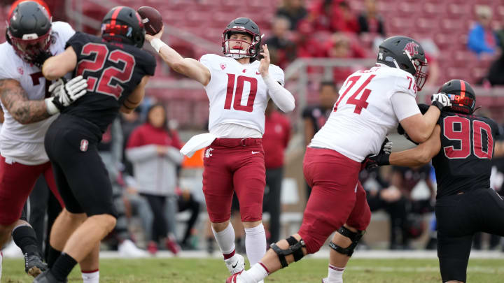 Nov 5, 2022; Stanford, California, USA; Washington State Cougars quarterback John Mateer (10) throws a touchdown pass against the Stanford Cardinal during the fourth quarter at Stanford Stadium. Mandatory Credit: Darren Yamashita-USA TODAY Sports