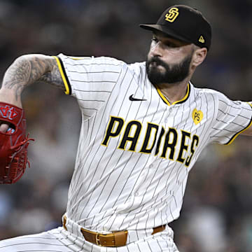 Aug 20, 2024; San Diego, California, USA; San Diego Padres relief pitcher Tanner Scott (66) pitches against the Minnesota Twins during the eighth inning at Petco Park.