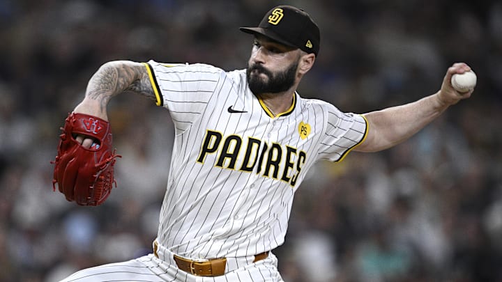 Aug 20, 2024; San Diego, California, USA; San Diego Padres relief pitcher Tanner Scott (66) pitches against the Minnesota Twins during the eighth inning at Petco Park.