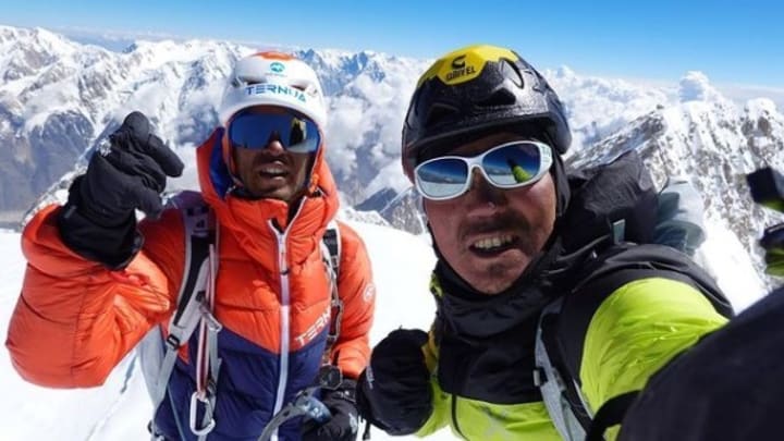 Hiraide and Nakajima on the summit of Tirich Mir