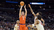Mar 30, 2024; Los Angeles, CA, USA; Clemson Tigers guard Joseph Girard III (11) shoots against Alabama Crimson Tide guard Aaron Estrada (55) and forward Jarin Stevenson (15) and forward Nick Pringle (23) in the first half in the finals of the West Regional of the 2024 NCAA Tournament at Crypto.com Arena. Mandatory Credit: Jayne Kamin-Oncea-USA TODAY Sports