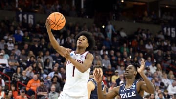 Mar 22, 2024; Spokane, WA, USA; Auburn Tigers guard Aden Holloway (1) attempts a layup against Yale Bulldogs guard Bez Mbeng (2) during the second half of a game in the first round of the 2024 NCAA Tournament at Spokane Veterans Memorial Arena. Mandatory Credit: James Snook-USA TODAY Sports 