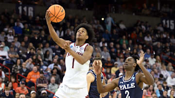 Mar 22, 2024; Spokane, WA, USA; Auburn Tigers guard Aden Holloway (1) attempts a layup against Yale