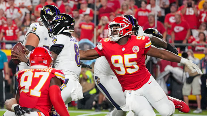 Sep 5, 2024; Kansas City, Missouri, USA; Kansas City Chiefs defensive tackle Chris Jones (95) sacks Baltimore Ravens quarterback Lamar Jackson (8) causing a fumble during the first half at GEHA Field at Arrowhead Stadium. Mandatory Credit: Denny Medley-Imagn Images