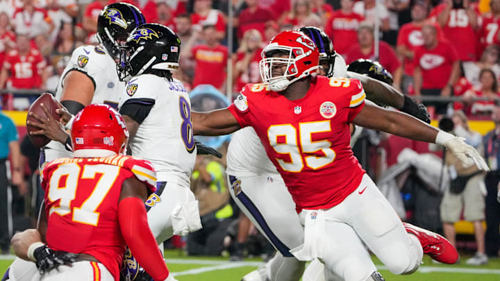 Kansas City Chiefs defensive tackle Chris Jones sacks Baltimore Ravens quarterback Lamar Jackson causing a fumble during the first half at GEHA Field at Arrowhead Stadium.