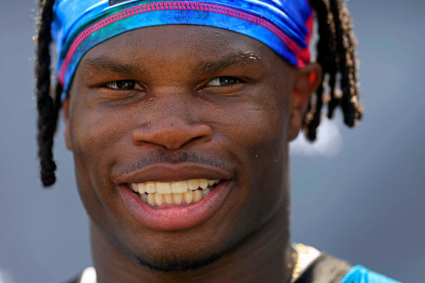 Jacksonville Jaguars wide receiver Travis Hunter (12) speaks to members of the media during the second mandatory minicamp at 