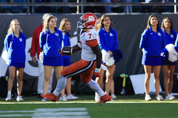 Clemson Tigers running back Phil Mafah scores a touchdown in the TaxSlayer Gator Bowl.