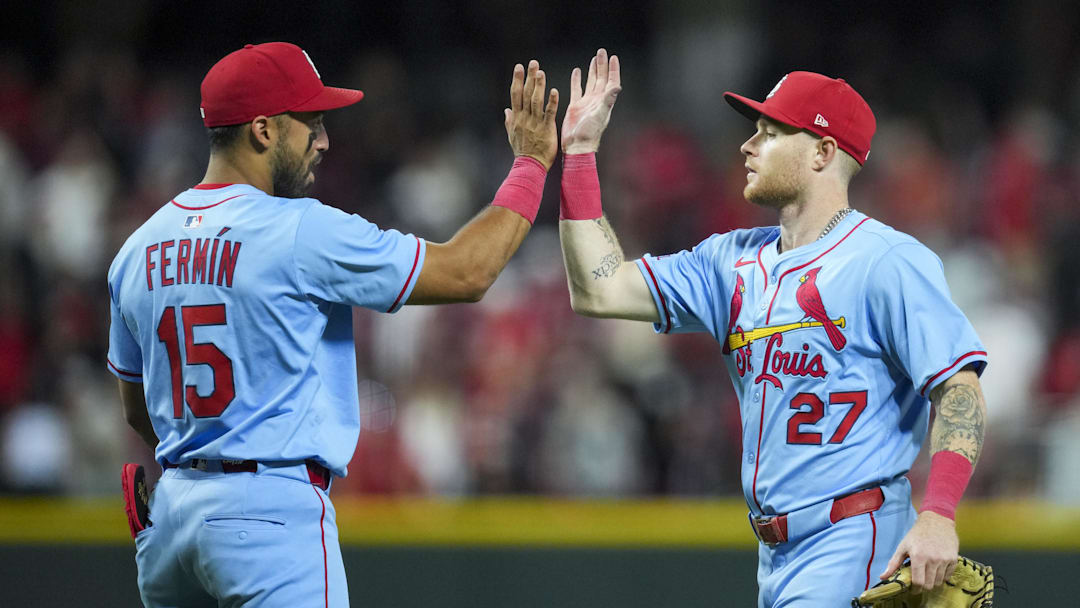 Aug 30, 2025; Cincinnati, Ohio, USA; St. Louis Cardinals second baseman Jose Fermin (15) high-fives outfielder Nathan Church (27) after the final out against the Cincinnati Reds in the ninth inning at Great American Ball Park. Mandatory Credit: Aaron Doster-Imagn Images Aug 30, 2025; Cincinnati, Ohio, USA; St. Louis Cardinals second baseman Jose Fermin (15) high-fives outfielder Nathan Church (27) after the final out against the Cincinnati Reds in the ninth inning at Great American Ball Park. Mandatory Credit: Aaron Doster-Imagn Images