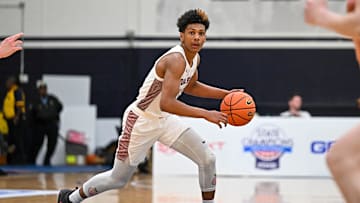 Apr 7, 2023; Washington, DC, USA; Sidwell Friends (DC) guard Acaden Lewis (20) handles the ball during the first quarter against Corner Canyon (UT) at Georgetown University. Mandatory Credit: Reggie Hildred-Imagn Images