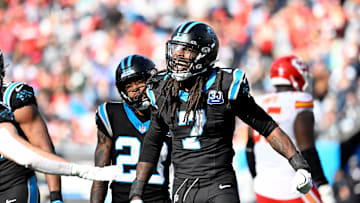 Nov 24, 2024; Charlotte, North Carolina, USA; Carolina Panthers linebacker Jadeveon Clowney (7) reacts after making a sack in the second quarter at Bank of America Stadium. Mandatory Credit: Bob Donnan-Imagn Images