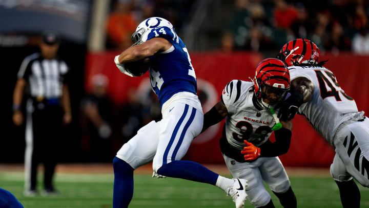 Cincinnati Bengals safety Daijahn Anthony (33) attempts to tackle Indianapolis Colts wide receiver Alec Pierce (14) in the first quarter between the Cincinnati Bengals and the Indianapolis Colts at Paycor Stadium in Cincinnati on Thursday, Aug. 22, 2024.