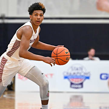 Apr 7, 2023; Washington, DC, USA; Sidwell Friends (DC) guard Acaden Lewis (20) handles the ball during the first quarter against Corner Canyon (UT) at Georgetown University. Mandatory Credit: Reggie Hildred-Imagn Images