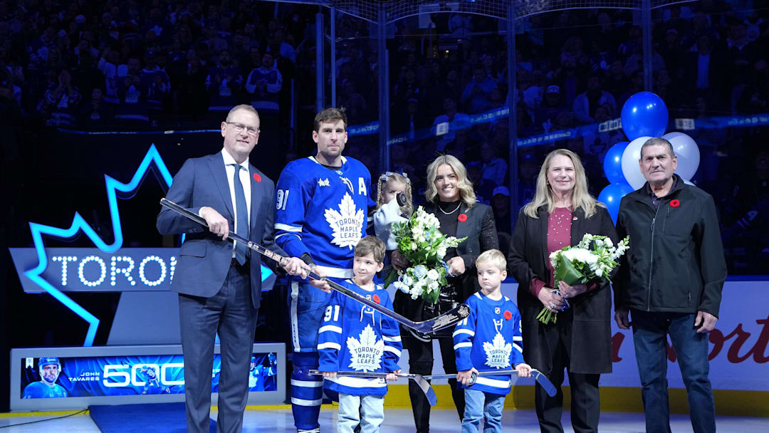 Nov 5, 2025; Toronto, Ontario, CAN; Toronto Maple Leafs General Manager Brad Treliving presents Toronto Maple Leafs center John Tavares (91) with a silver stick for his 500th career goals in the NHL before a game against the Utah Mammoth at Scotiabank Arena. Mandatory Credit: Nick Turchiaro-Imagn Images