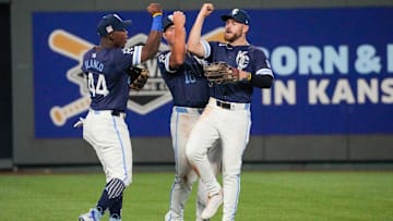 Jul 19, 2024; Kansas City, Missouri, USA; Kansas City Royals outfielder Dairon Blanco (44) and right fielder Hunter Renfroe (16) and center fielder Kyle Isbel (28) celebrate in the outfield after the win over the Chicago White Sox at Kauffman Stadium. Mandatory Credit: Denny Medley-Imagn Images