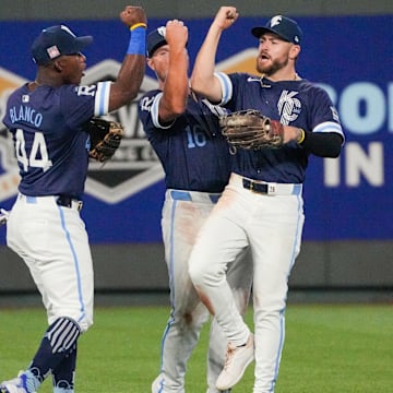 Jul 19, 2024; Kansas City, Missouri, USA; Kansas City Royals outfielder Dairon Blanco (44) and right fielder Hunter Renfroe (16) and center fielder Kyle Isbel (28) celebrate in the outfield after the win over the Chicago White Sox at Kauffman Stadium. Mandatory Credit: Denny Medley-Imagn Images