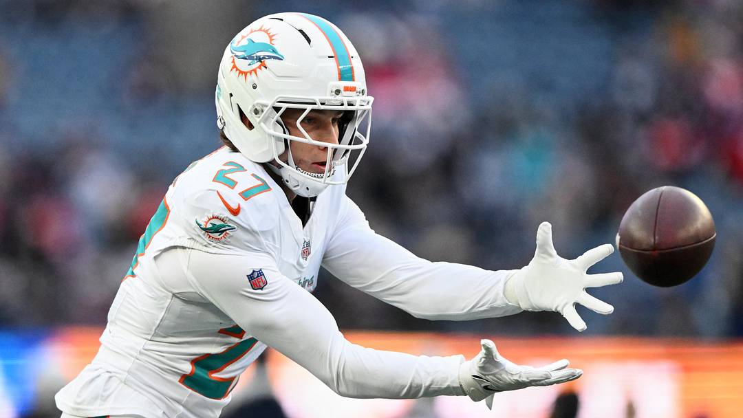 Miami Dolphins cornerback Ethan Bonner (27) catches the ball before the game against the New England Patriots at Gillette Stadium in the 2025 season finale.