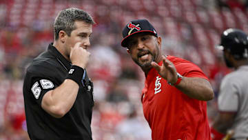 Jul 13, 2025; St. Louis, Missouri, USA;  St. Louis Cardinals manager Oliver Marmol (37) argues with umpire Brennan Miller (55) after he was ejected from the game against the Atlanta Braves during the ninth inning at Busch Stadium. Mandatory Credit: Jeff Curry-Imagn Images