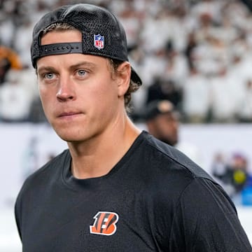 Injured Cincinnati Bengals quarterback Joe Burrow (9) walks on the field after the fourth quarter of the NFL Week 7 game between the Cincinnati Bengals and the Pittsburgh Steelers at Paycor Stadium in downtown Cincinnati on Thursday, Oct. 16, 2025. The Bengals won, 33-31.