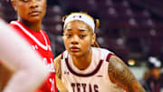 Mar. 20, 2025, Texas Southern Tigers forward Treasure Thompson defending St. Mary's Gaels guard  Kennedy Johnson at the 2025 WNIT basketball game at H&PE Arena in Houston, TX