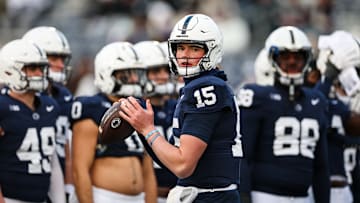 Drew Allar #15 of the Penn State Nittany Lions attempts a pass before the game against the Maryland Terrapins at Beaver Stadium on November 30, 2024 in State College, Pennsylvania.