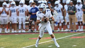 St. Xavier quarterback Chase Herbstreit drops back to pass during the Bombers' football game against Lakota West Friday, Aug. 23, 2024.