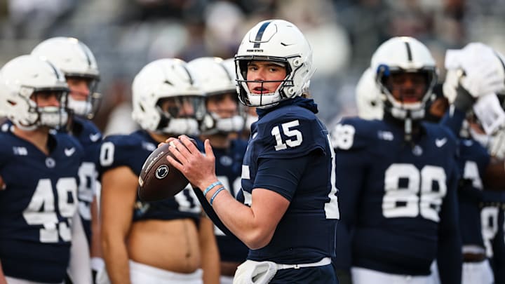 Drew Allar #15 of the Penn State Nittany Lions attempts a pass before the game against the Maryland Terrapins at Beaver Stadium on November 30, 2024 in State College, Pennsylvania.