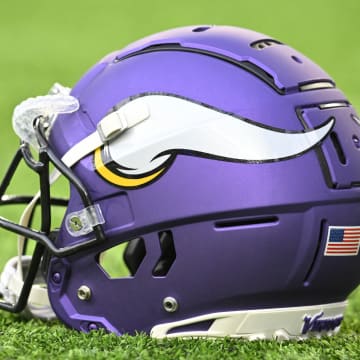 Aug 19, 2023; Minneapolis, Minnesota, USA; A Minnesota Vikings helmet sits on the turf before the game against the Tennessee Titans at U.S. Bank Stadium.
