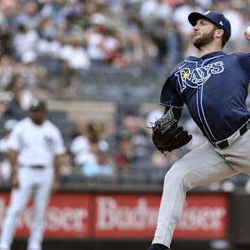 Jul 21, 2024; Bronx, New York, USA; Tampa Bay Rays pitcher Colin Poche (38) pitches against the New York Yankees during the sixth inning at Yankee Stadium.