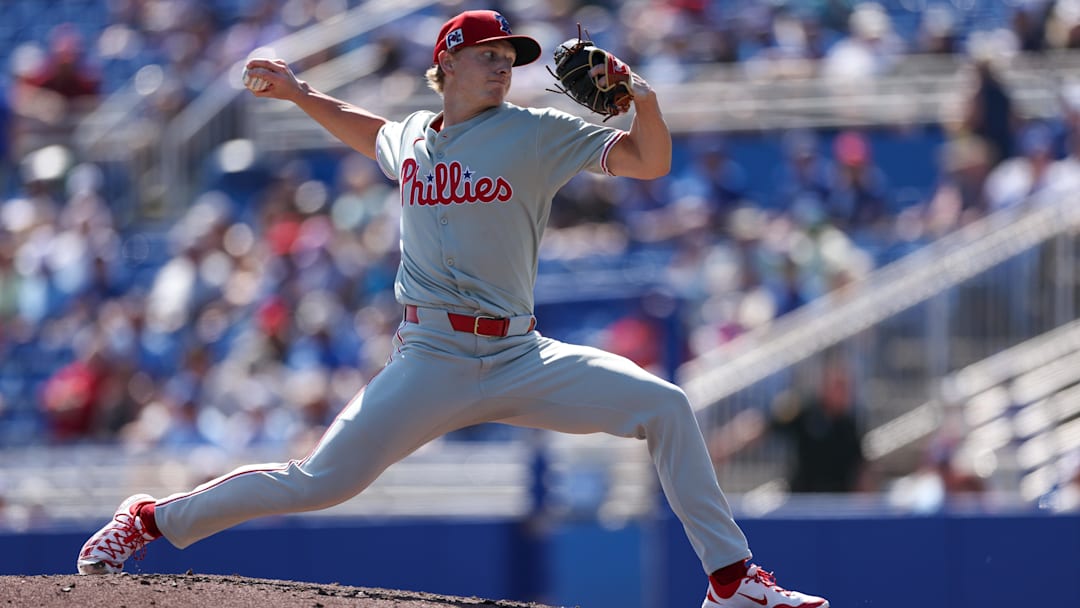 Feb 26, 2025; Dunedin, Florida, USA; Philadelphia Phillies pitcher Seth Johnson (51) throws a pitch against the Toronto Blue Jays in the third inning during spring training at TD Ballpark. 