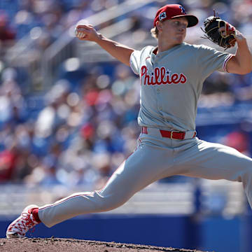 Feb 26, 2025; Dunedin, Florida, USA; Philadelphia Phillies pitcher Seth Johnson (51) throws a pitch against the Toronto Blue Jays in the third inning during spring training at TD Ballpark. 