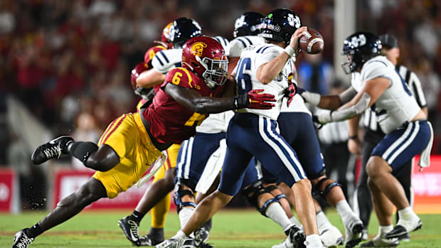 Sep 7, 2024; Los Angeles, California, USA; USC Trojans defensive end Anthony Lucas (6) attempts to sack Utah State Aggies