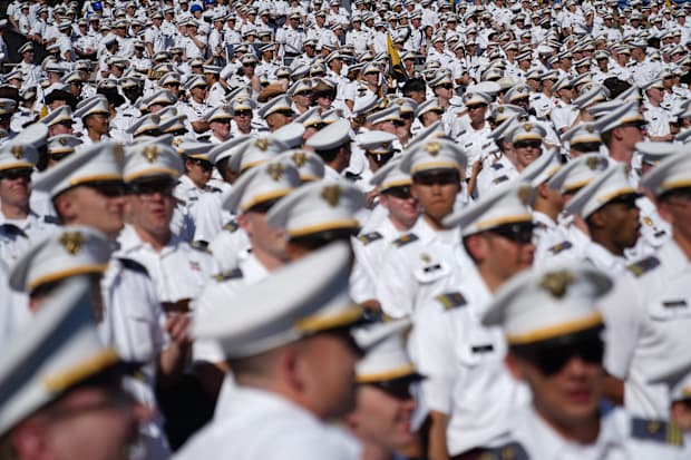 Army cadets look on during the football game against East Carolina.