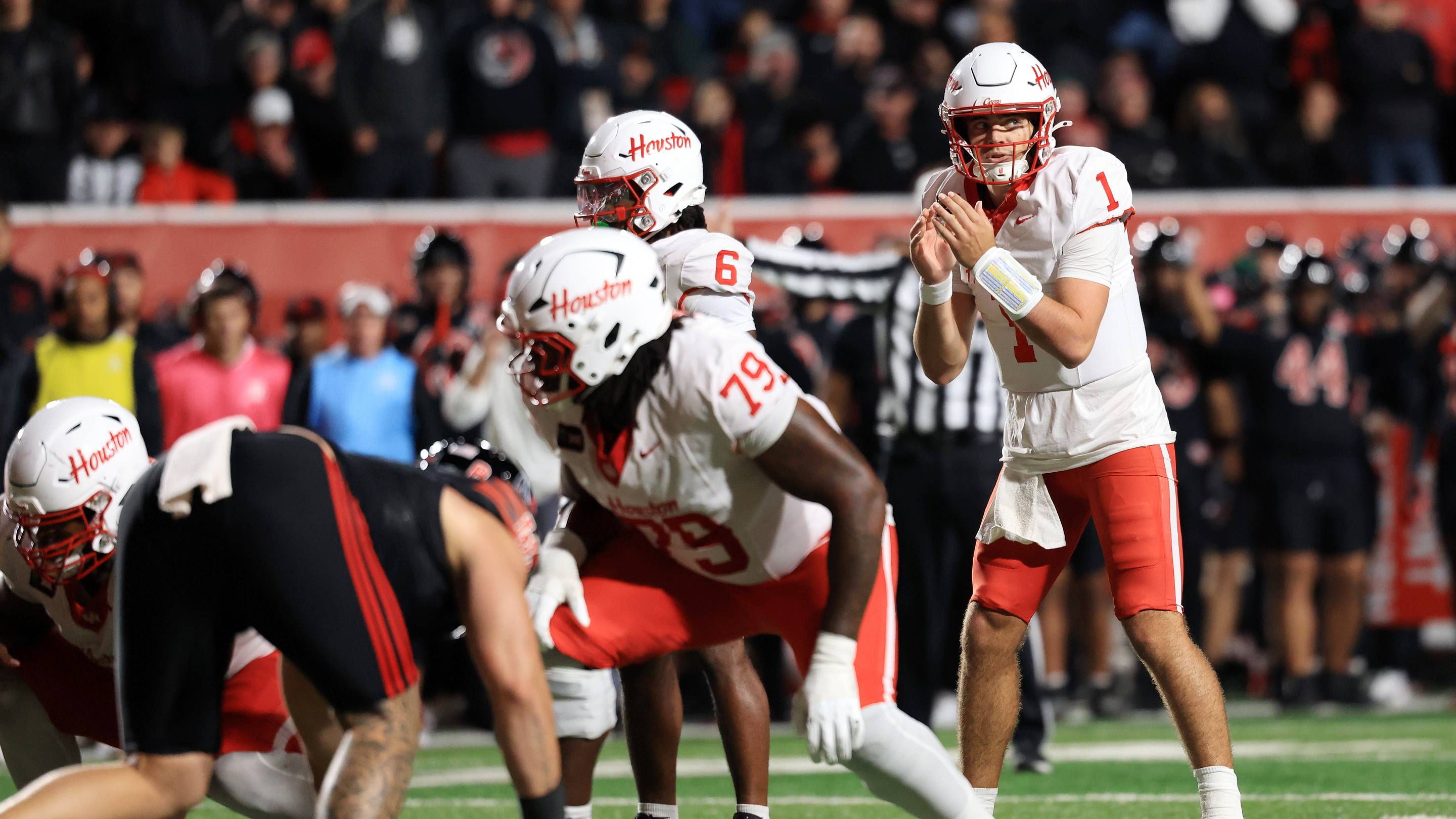Oct 24, 2026; Salt Lake City, Utah, USA; Houston Cougars quarterback Conner Weigman (1) prepares to take a snap during the third quarter Utah Utes at Rice-Eccles Stadium. Mandatory Credit: Rob Gray-Imagn Images | IMAGN IMAGES via Reuters Connect