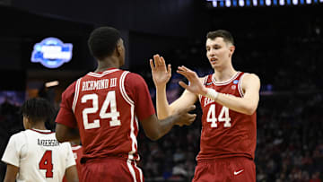 Mar 27, 2025; San Francisco, CA, USA; Arkansas Razorbacks forward Billy Richmond III (24) high-fives forward Zvonimir Ivisic (44) during the first half against the Texas Tech Red Raiders during a West Regional semifinal of the 2025 NCAA tournament at Chase Center. Mandatory Credit: Eakin Howard-Imagn Images