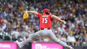 Sep 27, 2025; Milwaukee, Wisconsin, USA;  Cincinnati Reds pitcher Emilio Pagan (15) throws a pitch during the ninth inning against the Milwaukee Brewers at American Family Field. Mandatory Credit: Jeff Hanisch-Imagn Images
