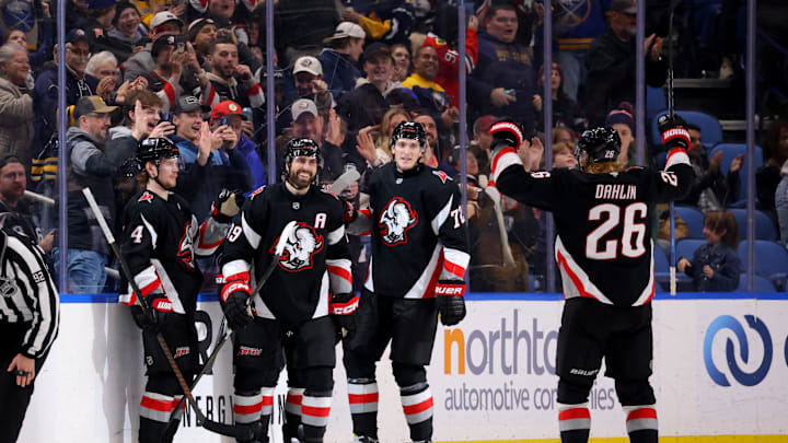 Dec 27, 2024; Buffalo, New York, USA;  Buffalo Sabres right wing Alex Tuch (89) celebrates his third goal of the game with teammates during the third period against the Chicago Blackhawks at KeyBank Center. Mandatory Credit: Timothy T. Ludwig-Imagn Images