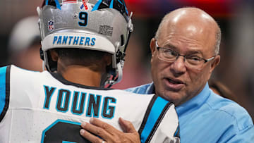 Sep 10, 2023; Atlanta, Georgia, USA; Carolina Panthers quarterback Bryce Young (9) hugs team owner David Tepper on the field prior to the game against the Atlanta Falcons at Mercedes-Benz Stadium. Mandatory Credit: Dale Zanine-Imagn Images