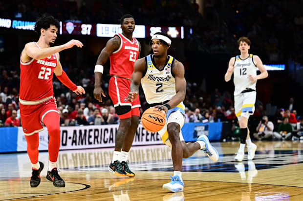 Marquette guard Chase Ross dribbles in the second half against New Mexico.