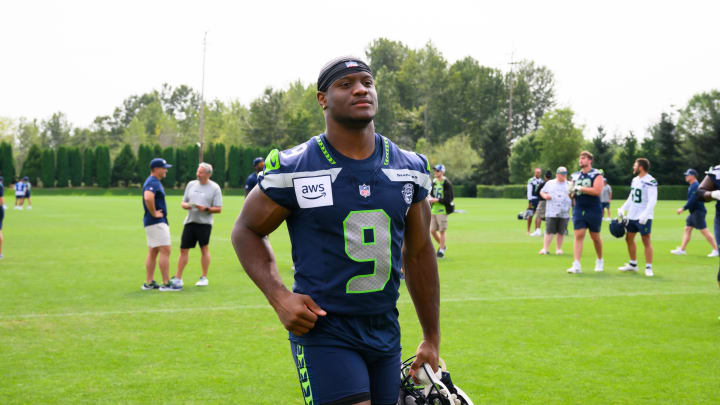 Jul 27, 2024; Renton, WA, USA; Seattle Seahawks running back Kenneth Walker III (9) jogs off the field after training camp at Virginia Mason Athletic Center. Mandatory Credit: Steven Bisig-USA TODAY Sports