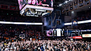 Vanderbilt fans storm the court to celebrate their Commodores win over the Tennessee Volunteers after their game at Memorial Gym in Nashville, Tenn., Saturday, Jan. 18, 2025.